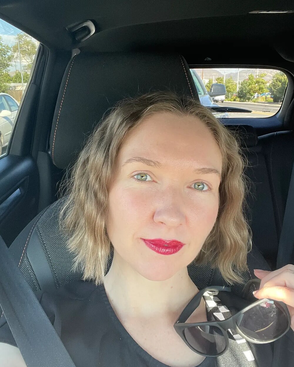 Jamie in her car
